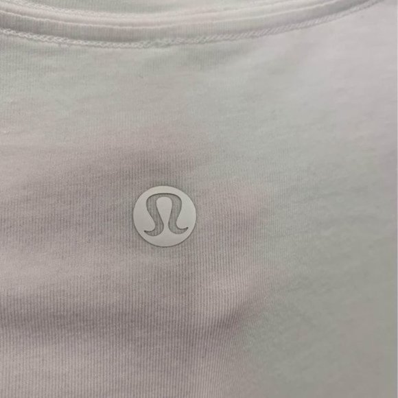 Lululemon lightweight white tank top. Crew neck. Size 6. Hem notch. - Picture 6 of 6